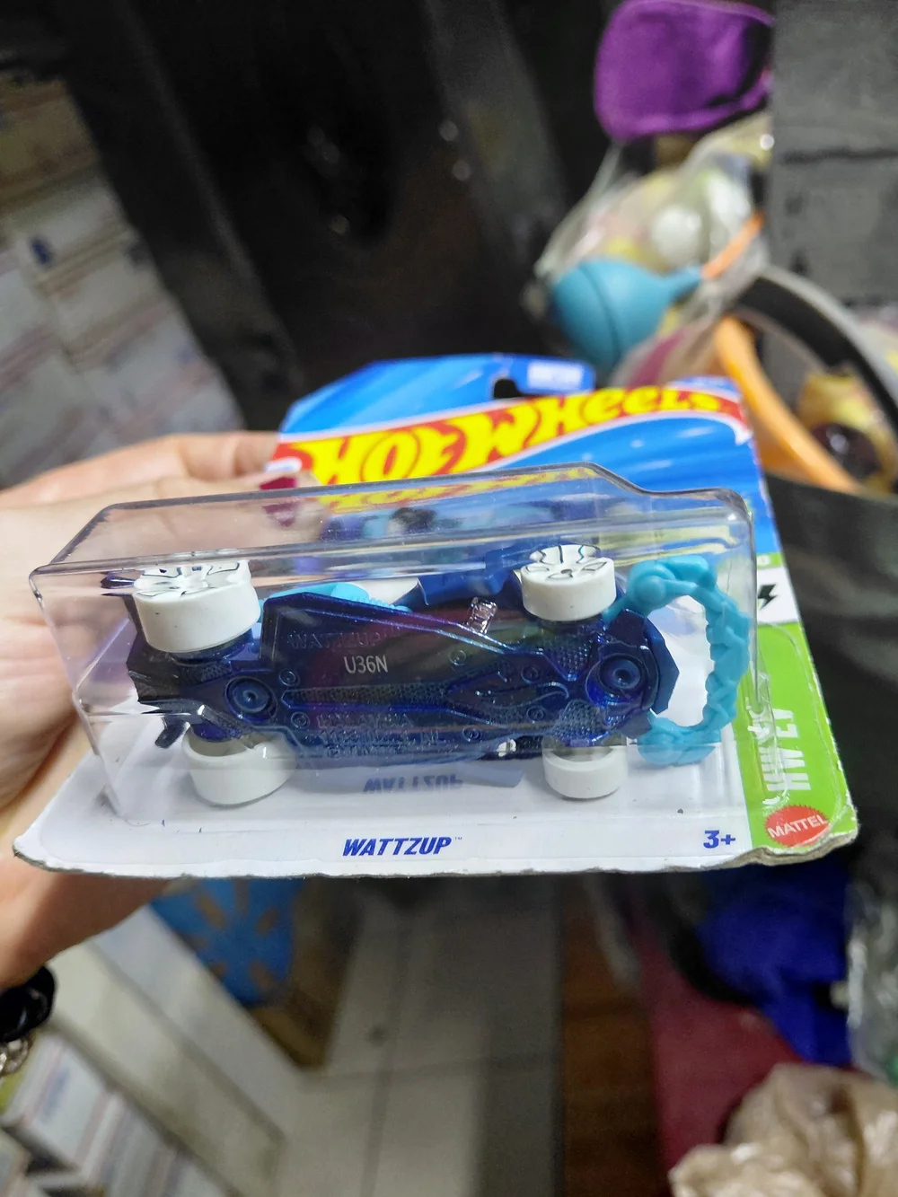 the Hot Wheels Wattzup electric concept car in blue from the HW EV series (4/10,